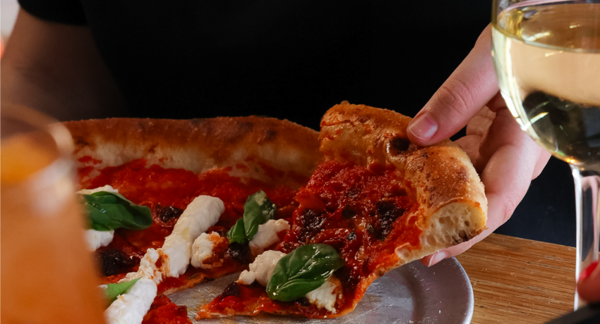 Grr_pizza_east_shoreditch_march_2026_spring_summer_menu_shoot_hand_holding_vegan_pizza_world_cup_10.6.26